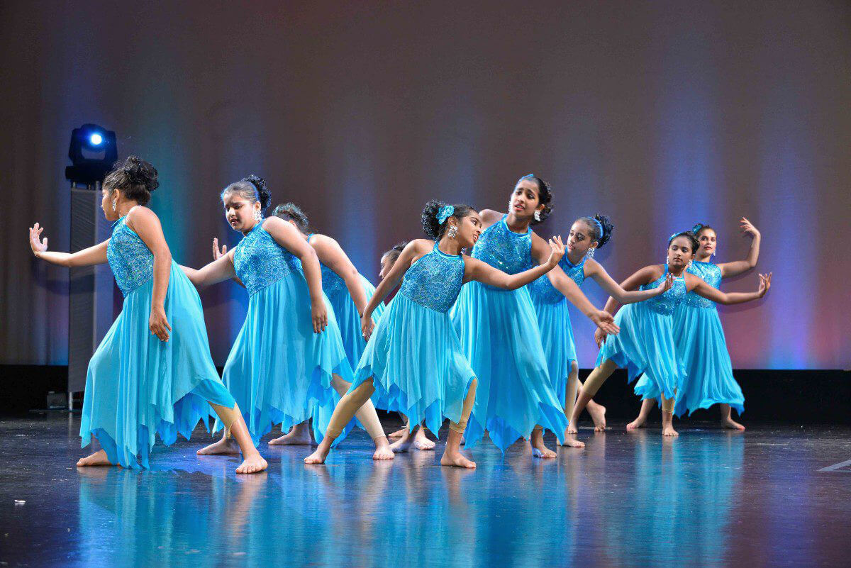 Elite Bollywood Contemporary dancers performing sophisticated choreography